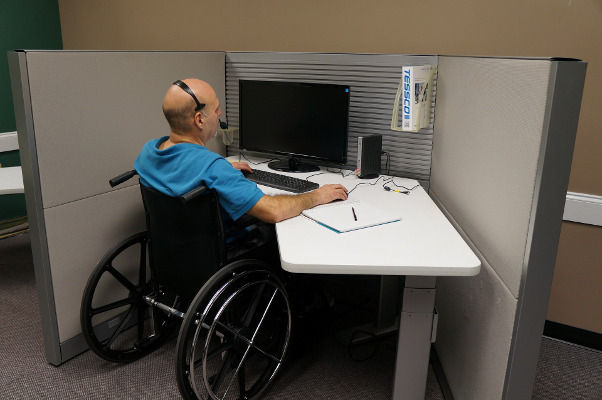 A disabled veteran working in a call center