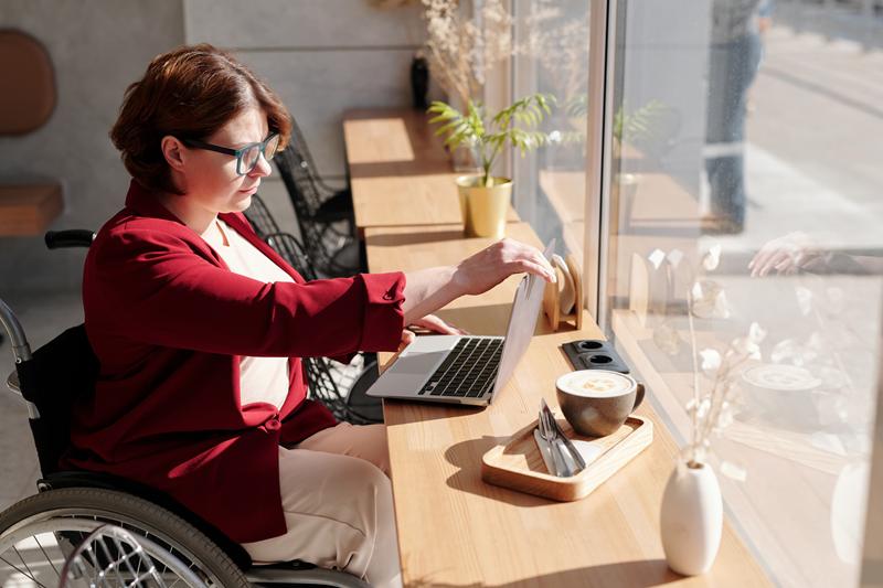 A woman doing accessibility testing on their computer